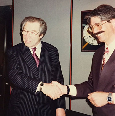 George Daniels shaking hands
