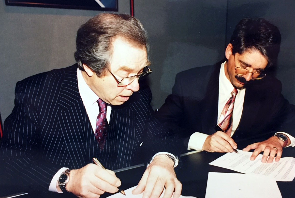 George Daniels is shown signing the agreement to adopt his Co-axial escapement with ETA in 1994